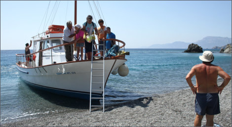 Boat arrival at Agios Minas beach