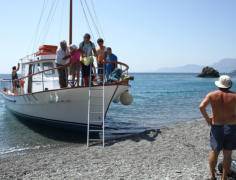 Passenger arrival at Agios Minas beach  in Olympos Karpathos